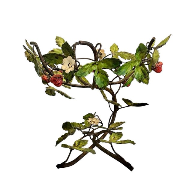A charming, vintage tole centerpiece. Features an iron, twig form base intertwined with leaves, strawberries and blossoms....