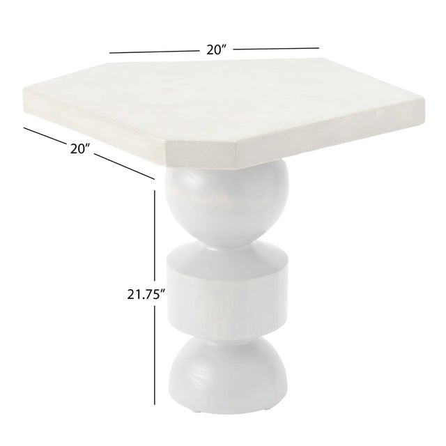 The Dorothy Side Table is a striking sculptural piece that blends architectural form with rich material contrast....