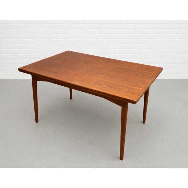 Danish Mid Century Modern TEAK Expandable DINING TABLE with two hidden leaves in a lovely streamlined size, perfect for...
