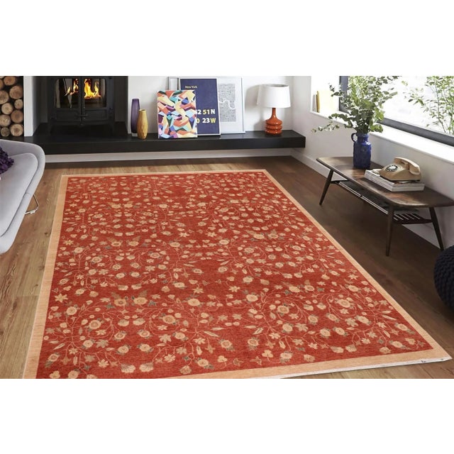 "Enhance the ambiance of your home with this magnificent Persian-influenced Turkish hand-knotted rug made by skilled...