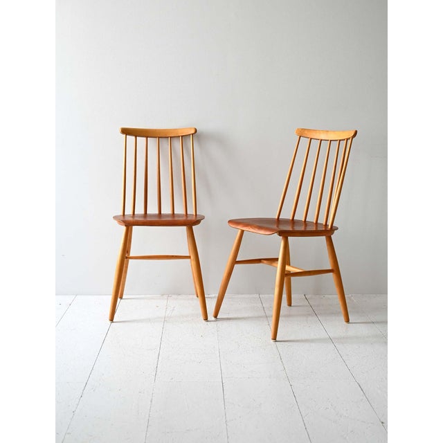 Scandinavian chairs from the late 1950s, inspired by Tapiovaara's Fanett model, with a mahogany seat and beech frame. A...