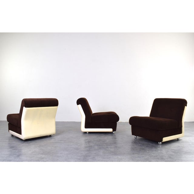 This modular sofa was manufactured in Germany in the 1970s. The sofa consists of three modules, each upholstered in the...