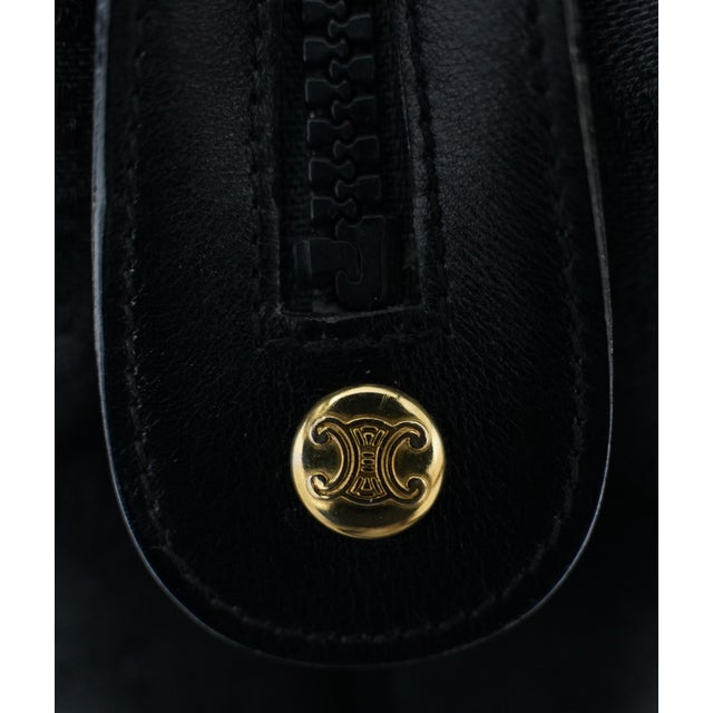 Classic vintage Celine Black Leather and Jacquard Macadam Triomphe Top Handle Bag Iconic macadam pattern and gold toned...