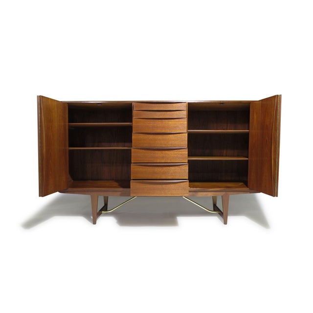 Sideboard designed by Kurt Ostervig for Brande Møbelfabrik, Denmark, 1956. Features a stunning old-growth teak exterior...