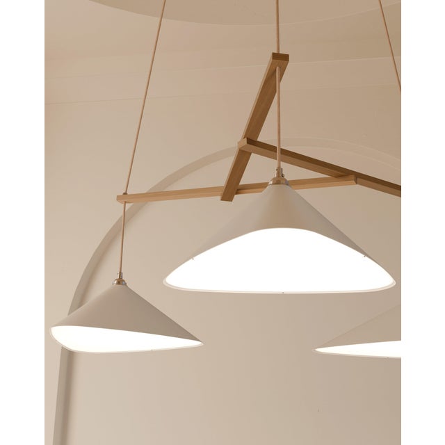 Emily is a series of gorgeous lamps with shades handmade of sheet steel. She is spray painted in a semi-matte Crème White...