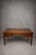 Elegant French Empire-style executive desk featuring a refined leather writing surface, five drawers, and decorative gilt-...