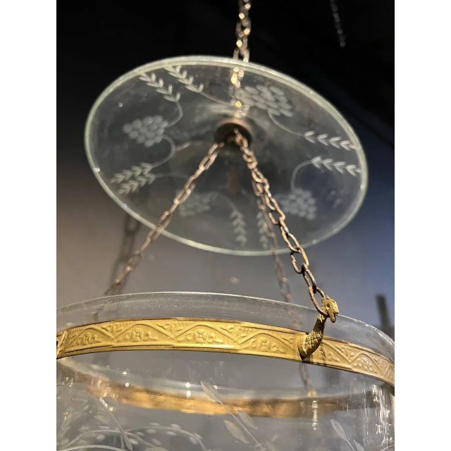 A circa 1940's glass lantern with grape design