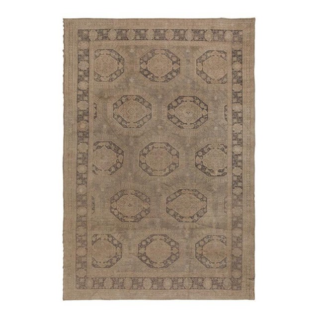 An exceptional antique Turkish Oushak rug, handwoven in wool circa 1870–1890, measuring 12x18. This piece reflects the...
