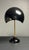 Wonderfully proportioned desk or table lamp in black metal shade on brass base. This midcentury Italian lamp is in great...