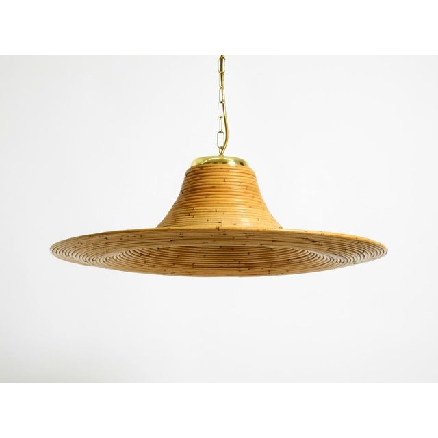 Beautiful, huge, round, 1970s bright bamboo wood pendant lamp. made in italy. In the style of vivai del sud. great italian...
