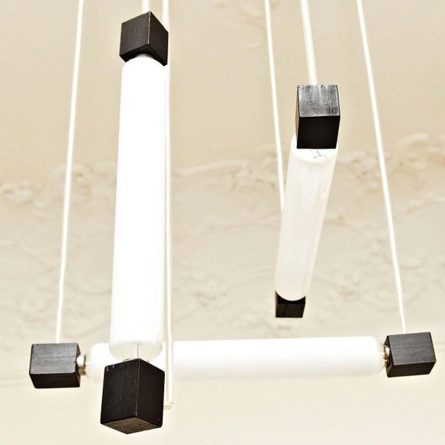 Hanging lamp, designed in the style of Rietveld, executed circa 1960 by unknown manufacturer. Painted wooden structure and...