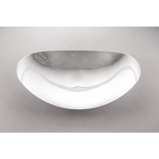 We are so happy to offer this sterling silver Mid-Century Tiffany dishes. It has an oval shape and curves upwards on the...