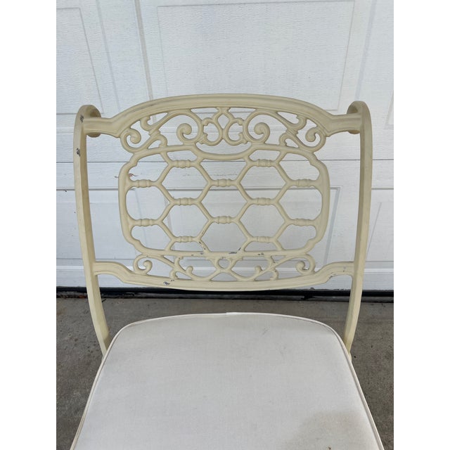 1960s Hollywood Regency style aluminum cast chair. Believed to be from Tropitone Veneman collection by Brown Jordan. While...