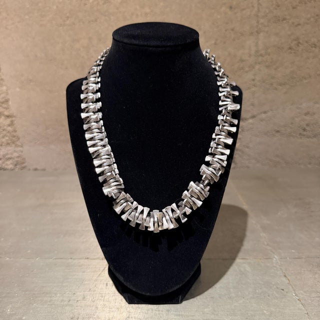 For your consideration, a vintage modernist brutalist articulated bone collar necklace. It features a highly collectible...