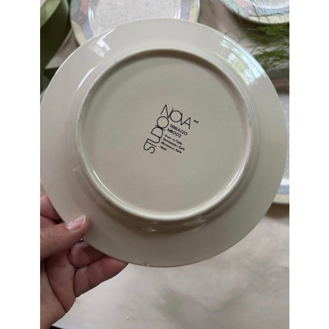 Charming set of four 1980s pastel plates by Studio nova, influenced by art deco patterns, these pale gray plates are...