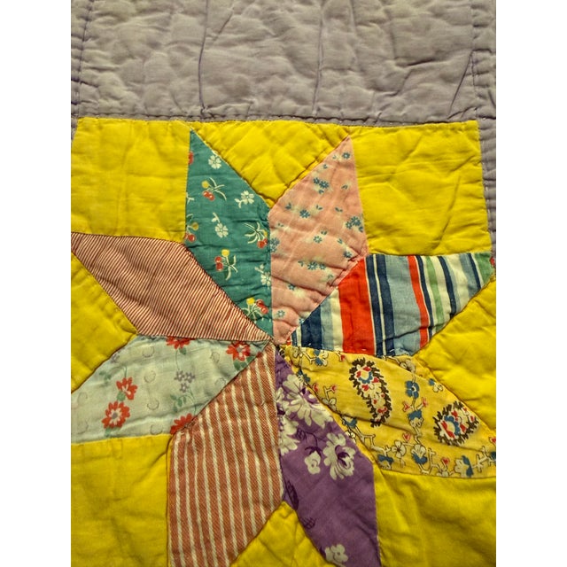 Vintage eight star quilt (North Star) hand pieced and hand quilted. Appears to have vintage fabrics from the 1930s or...