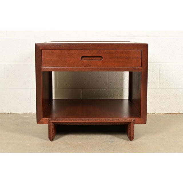 A rare and exceptional Mid-Century Modern "Taliesin" two-tier nightstand or side table By Frank Lloyd Wright for Heritage...