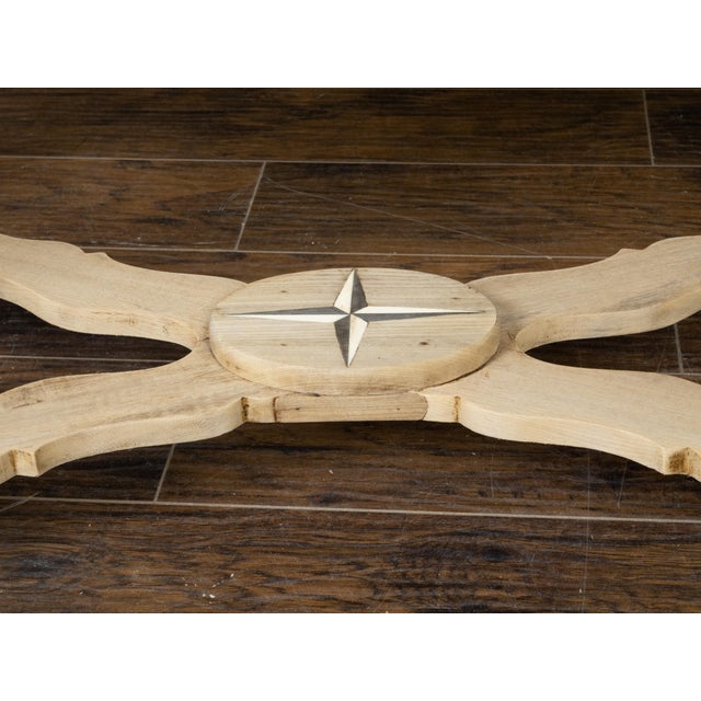 A Continental bleached walnut console table from the 19th century, with white marble top, long single drawer, faceted...
