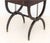 A pair of elegant English Regency side tables crafted in mahogany with inset tooled leather tops over a single frieze...