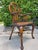 Striking vintage Gothic Revival Windsor armchair attributed to Theodore Alexander, featuring an architectural pierced...