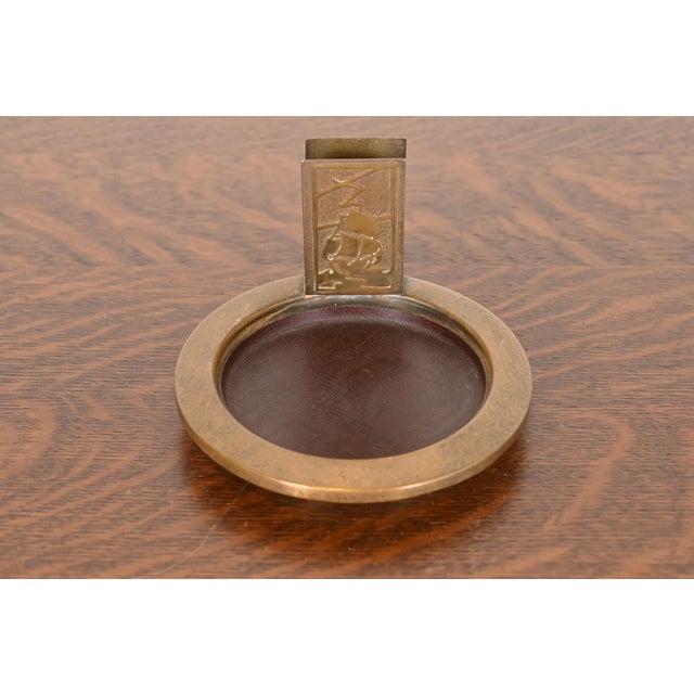 A beautiful Arts & Crafts period Nautical gilt bronze ashtray with match box holder By Silver Crest (the mark of Smith...