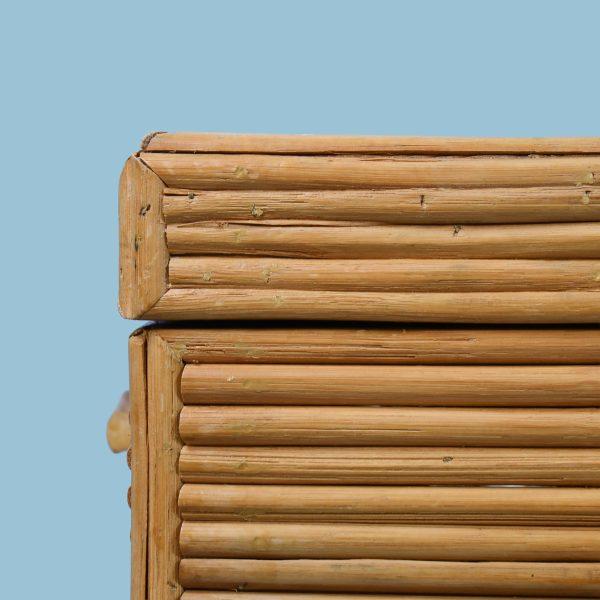 A storage trunk in split rattan, equal parts practical and decorative, made for stowing throws, games or poolside...