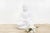 Indulge in the captivating beauty of our truly artistic sitting Buddha statue, meticulously crafted from pure white...
