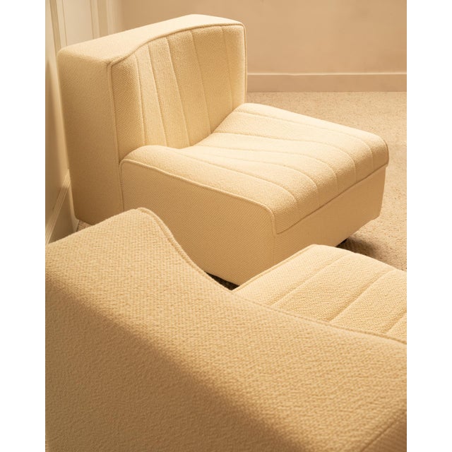 Pair of Tito Agnoli lounge chairs - Italy, 1970s Completely reupholstered in a creamy white textured fabric from Lelièvre...