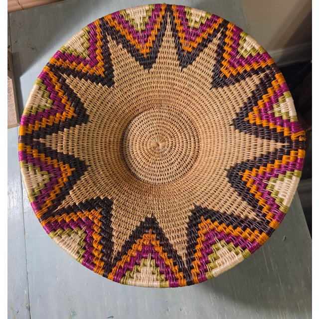 Age is difficult to tell because this Makenge Marriage Basket has been passed down through generations to new brides. The...