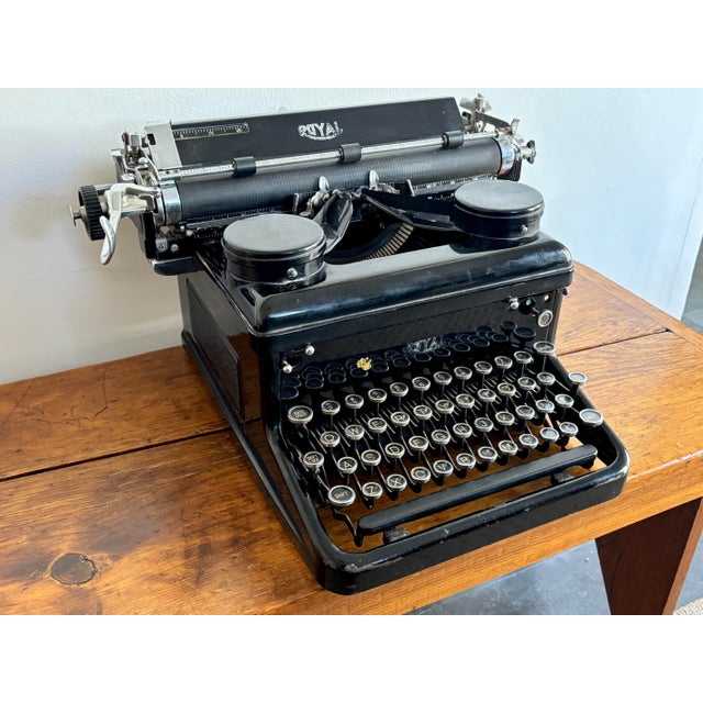 The Royal Typewriter Company manufactured this gorgeous black Royal KHM typewriter during the 1930s. This is Royal's first...