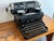 The Royal Typewriter Company manufactured this gorgeous black Royal KHM typewriter during the 1930s. This is Royal's first...