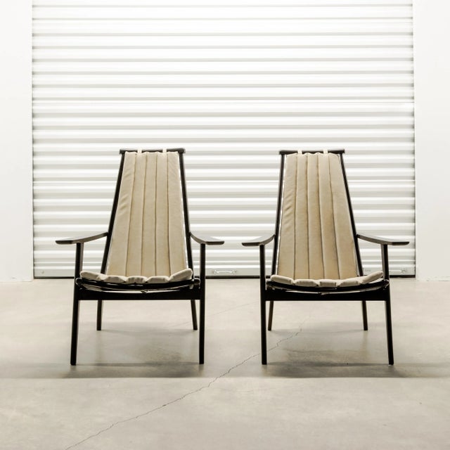 Pair of spindle back Nakashima style armchairs, Denmark circa 1960's. Sold individually.