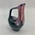 I love this small pitcher! Such unique and fantastic organic modern lines. Dark bottom and drip glazed from the top in...