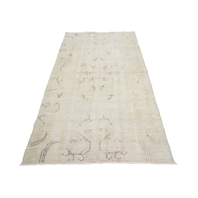 Washed Out vintage handknotted rug from Oushak region of Turkey. Approximately 50-60 years old. In very good condition