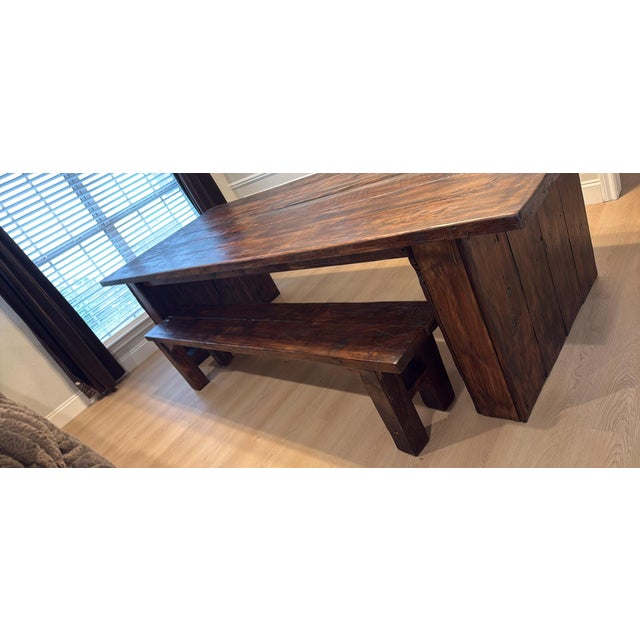 This handcrafted solid wood dining table was purchased brand new and has never even been used. The table features a...