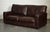 Vintage Distressed Brown Leather Two to Three Seater Sofa. It has a classic and elegant design with a worn-in look that...