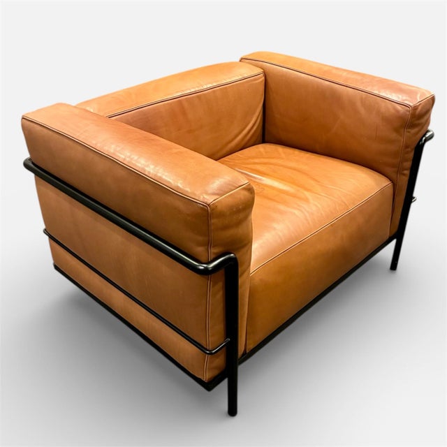 Le Corbusier Jeanneret Perriand Cassina LC3 Club Lounge Chair in raw siena leather with a black frame. Well marked (with...