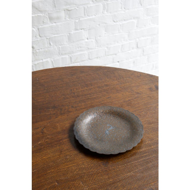 This elegant Art Deco dish from 1930s France features a beautifully etched deer motif at its center, surrounded by...