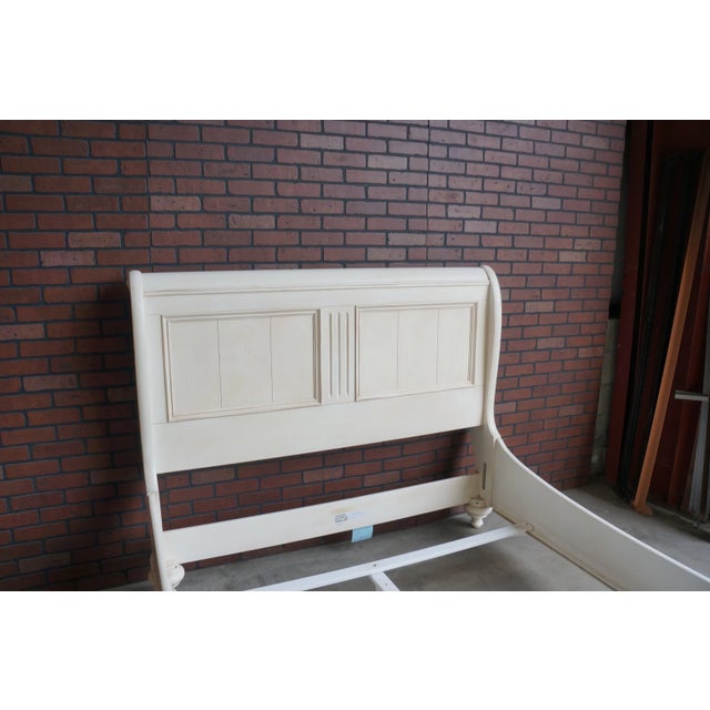 New Country queen sleigh bed showcasing an easygoing blend of American, English and European country. Finely crafted of...