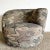Embrace the boldness of postmodern design with this Nautilus “Camo” Swivel Barrel Chair. This chair features a distinctive...