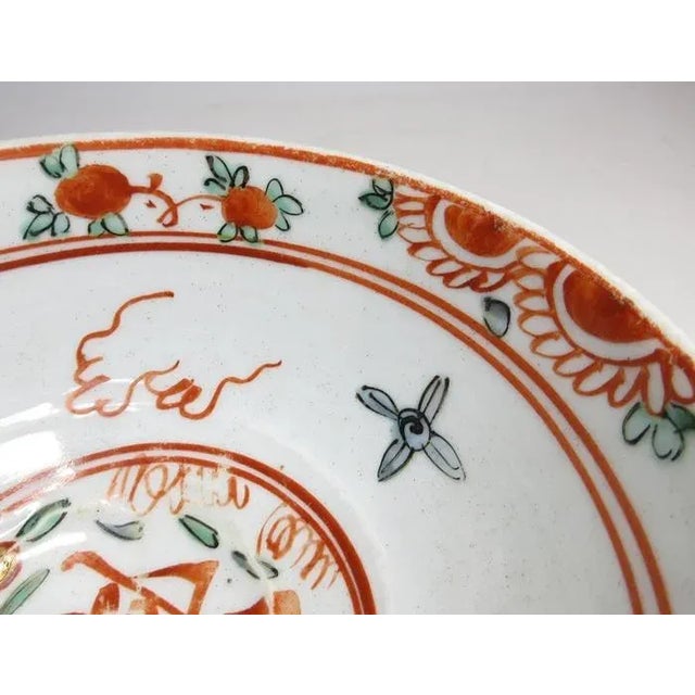 A Chinese porcelain bowl made for export to the Japanese market during the late Ming dynasty. Decorated with a signature...