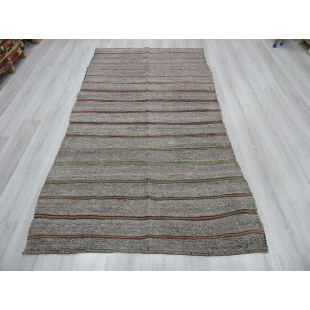 Vintage striped kilim rug from Adana region of Turkey.Approximately 45-55 years old. In good condition
