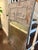 Tin-framed trumeau-style mirror with Greek key detail. Limewashed patina makes this an interesting piece for an entry way...
