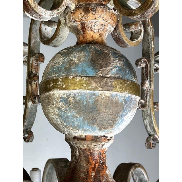 1 Active Conversation Twelve Light Spanish Wrought Iron & Wood Painted Chandelier For Sale - Image 10 of 15