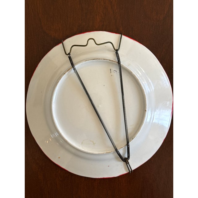 Traditional arts and crafts are making a return and this vintage hand crafted folk art style hanging plate will add color...