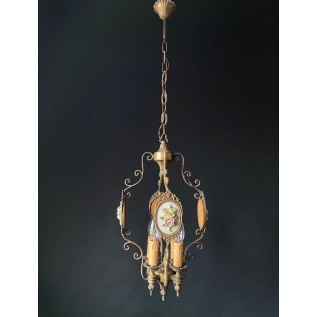 The chandelier is made of brass and bronze. Impeccable artistic forging. The chandelier is decorated with miniatures with...