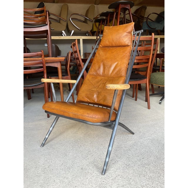 This stunning armchair is in good used condition, stable and sound in construction. The frame is made out of iron with a...