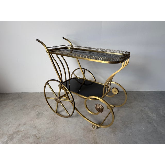 1960s 1960s Italian Hollywood Regency Scrolled Brass & Black Glass Two-Tier Bar Cart For Sale - Image 5 of 14