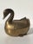 Patinated brass garden decor duck motif planter.