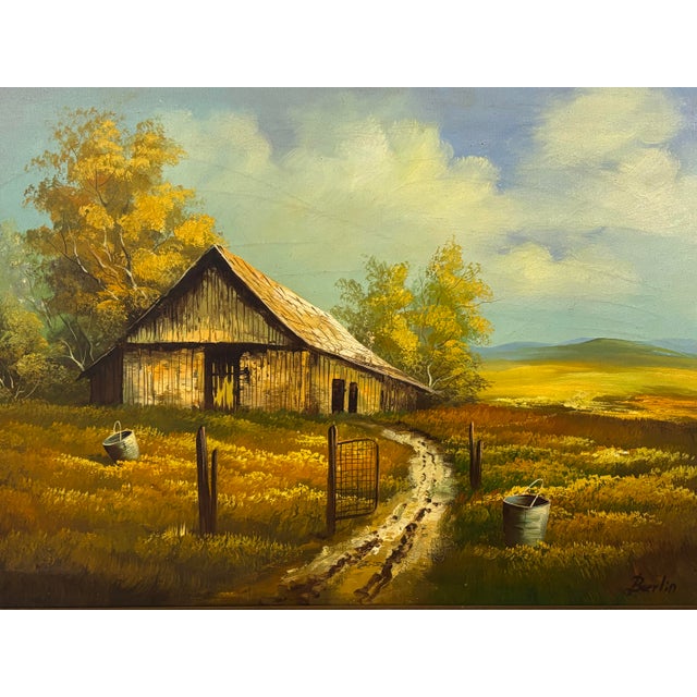 Charming vintage landscape oil painting featuring a weathered barn nestled among golden fields beneath an expansive sky....